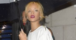 Rihanna holding an umbrella